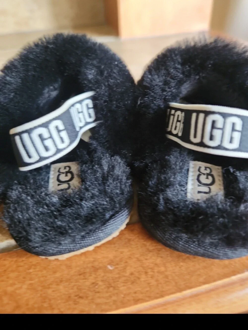 UGG Baby Black Fuzzy Slide Sandals with Logo Heel Strap